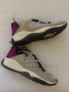 CHANEL Beige Quilted Suede Sneakers with Purple Heel Accent